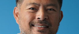 Mike de la Cruz_iAdvize_Headshot_1 1 (1)
